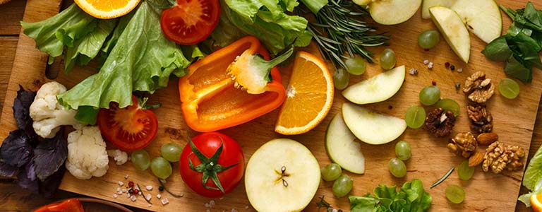 Vegetables spread across a wooden cutting board